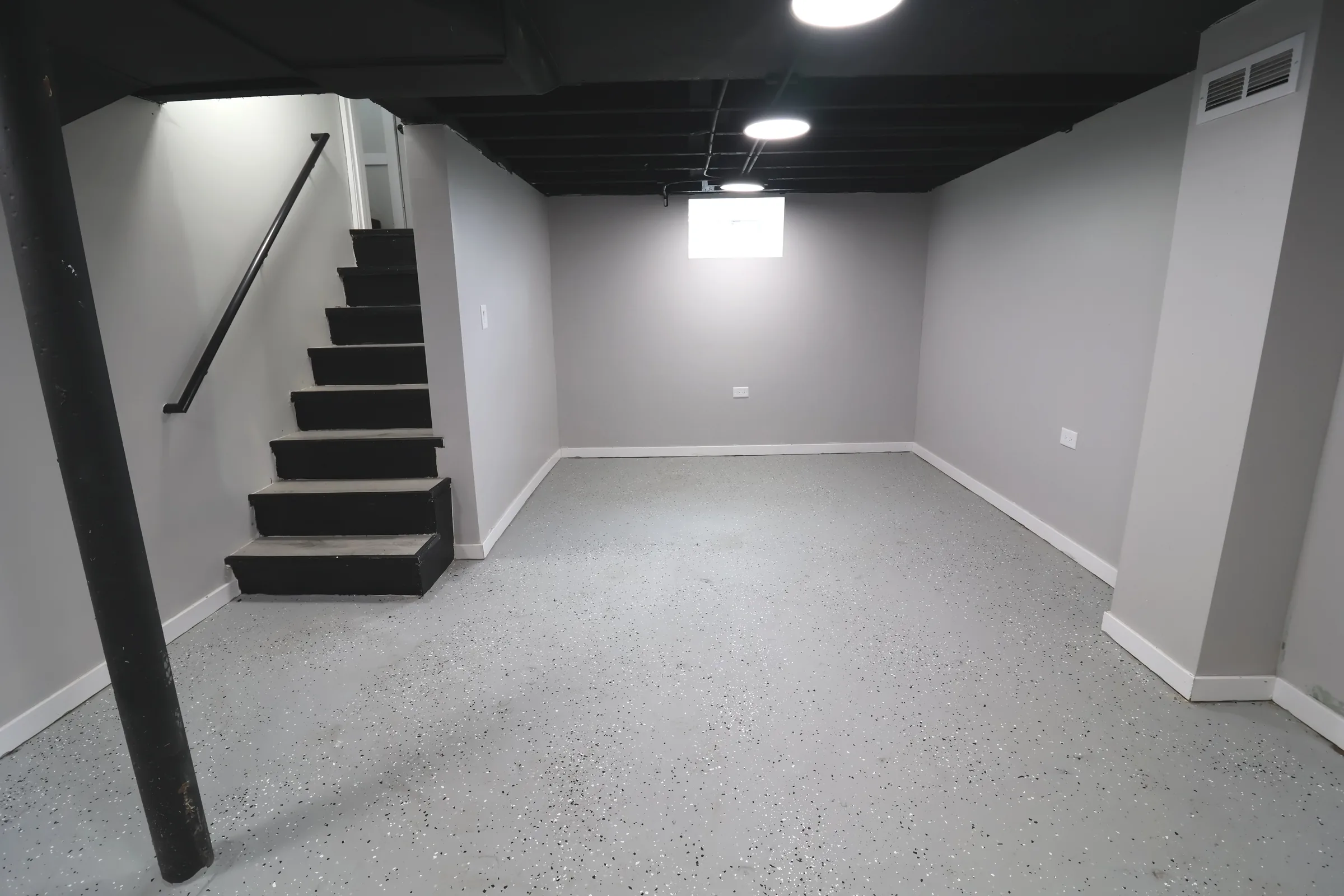 Finished basement stairs and room